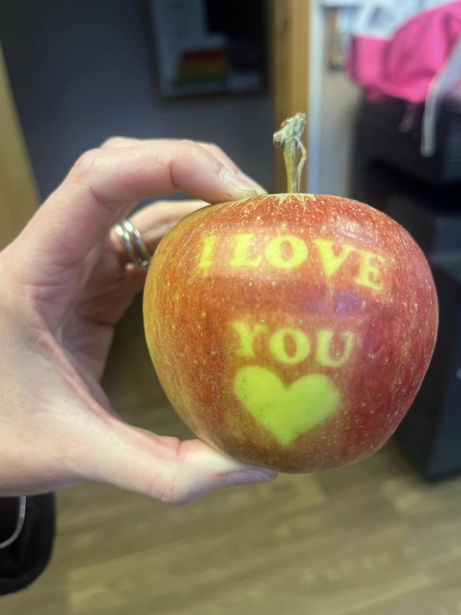 Apple with an I love you message